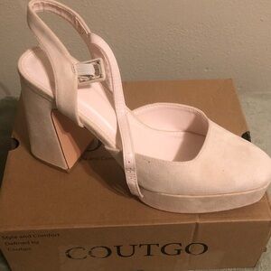 Cream colored platform
Size 9.5